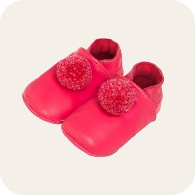 Chaussons bébé à pompons Fuschia